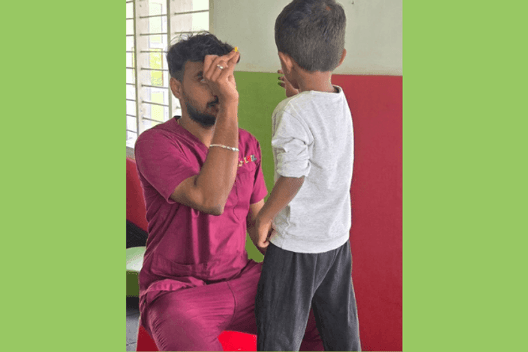 Therapist and a child practicing developmental therapy activities during a one-on-one therapy session.
