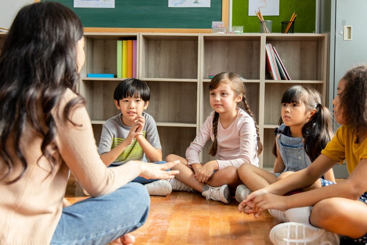 Group therapy helps children with autism build social skills, improve communication, develop emotional regulation, and gain confidence by learning and practicing these abilities in a supportive peer environment.